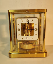 Load image into Gallery viewer, A 1987 Jaeger le Coultre 540 Calibre Swiss atmos clock with a square white dial