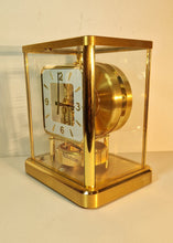 Load image into Gallery viewer, A 1987 Jaeger le Coultre 540 Calibre Swiss atmos clock with a square white dial