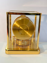 Load image into Gallery viewer, An Unused 560 Cal Moonphase Atmos Clock With Original Receipt, Box And Papers.