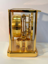 Load image into Gallery viewer, An Unused 560 Cal Moonphase Atmos Clock With Original Receipt, Box And Papers.