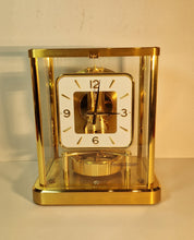 Load image into Gallery viewer, A 1987 Jaeger le Coultre 540 Calibre Swiss atmos clock with a square white dial