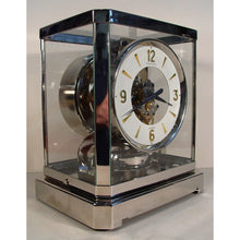Load image into Gallery viewer, A Rhodium Plated 1953 Jaeger Bell-Jar Model Swiss Atmos Clock With A White Dial