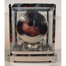 Load image into Gallery viewer, A Rhodium Plated 1953 Jaeger Bell-Jar Model Swiss Atmos Clock With A White Dial