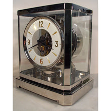 Load image into Gallery viewer, A Rhodium Plated 1953 Jaeger Bell-Jar Model Swiss Atmos Clock With A White Dial