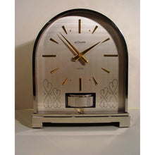 Load image into Gallery viewer, A Rare Rhodium Plated 1970's Swiss Bollard Model Atmos Clock In An Arch Topped Case