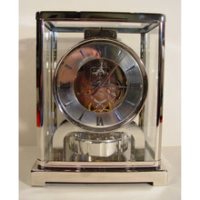 Load image into Gallery viewer, A Rare Early 1950's Rhodium Plated Jaeger Le Coultre Classic Model Swiss Atmos Clock With Roman Numerals