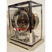 Load image into Gallery viewer, A Rare Early 1950's Rhodium Plated Jaeger Le Coultre Classic Model Swiss Atmos Clock With Roman Numerals