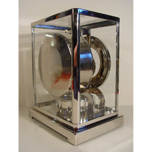 Load image into Gallery viewer, A Rare Early 1950's Rhodium Plated Jaeger Le Coultre Classic Model Swiss Atmos Clock With Roman Numerals