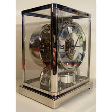 Load image into Gallery viewer, A Rare Early 1950's Rhodium Plated Jaeger Le Coultre Classic Model Swiss Atmos Clock With Roman Numerals