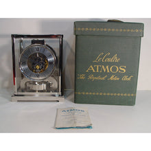 Load image into Gallery viewer, A 1950&#39;s Rhodium Plated Jaeger Classic Model Swiss Atmos Clock With Roman Numerals And Box
