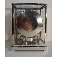 Load image into Gallery viewer, A 1950's Rhodium Plated Jaeger Classic Model Swiss Atmos Clock With Roman Numerals And Box