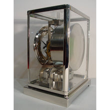 Load image into Gallery viewer, A 1950's Rhodium Plated Jaeger Classic Model Swiss Atmos Clock With Roman Numerals And Box