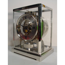 Load image into Gallery viewer, A 1950's Rhodium Plated Jaeger Classic Model Swiss Atmos Clock With Roman Numerals And Box