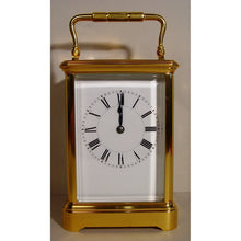 Load image into Gallery viewer, A Fine Quality Late19th Century Antique French Gilded And Laquered Corniche Cased Striking Carriage Clock By Henry Jacot, Paris