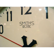 Load image into Gallery viewer, An English 1940’s Smiths Sectric 12-inch Dial Wall Clock In A Bakerlight Case,