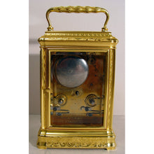 Load image into Gallery viewer, A Stunning Quality Mid 19th Century French Engraved Gilt Bronze Gorge Case Antique Repeating Carriage Clock With The Original Red Moroccan Leather Travelling Box By Henry Lepaute Retailed By With Wilson And Gandar,392 Strand, London
