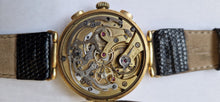 Load image into Gallery viewer, A 1925 18k Yellow gold Universal. Genève chronograph wristwatch.