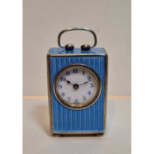 Load image into Gallery viewer, A silver and blue enamel eight day Swiss clock.
