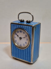 Load image into Gallery viewer, A silver and blue enamel eight day Swiss clock.
