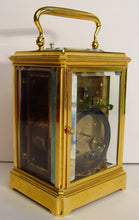 Load image into Gallery viewer, A Fine Quality French Gilt Gorge Cased Repeating Carriage Clock By Soldano
