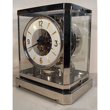 Load image into Gallery viewer, A Rhodium Plated 1953 Jaeger Bell-Jar Model Swiss Atmos Clock With A White Dial
