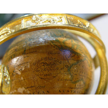 Load image into Gallery viewer, A French Ormolu Mantle Clock By Le Roy, Paris With, Calandar Work, Moon Phase And Rotating World Time Globe
