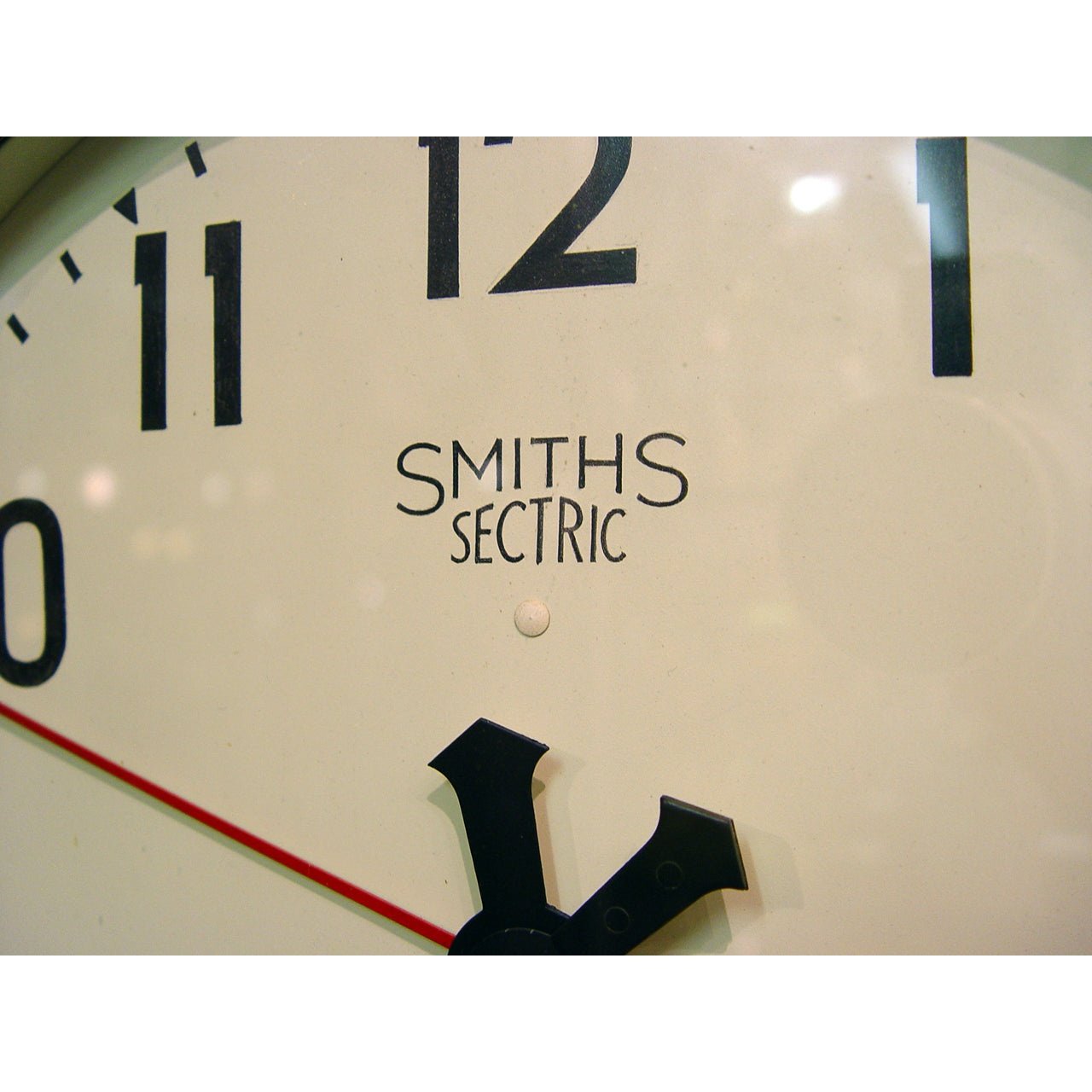 An English 1940's Smiths Sectric 12-inch Dial Wall Clock In A